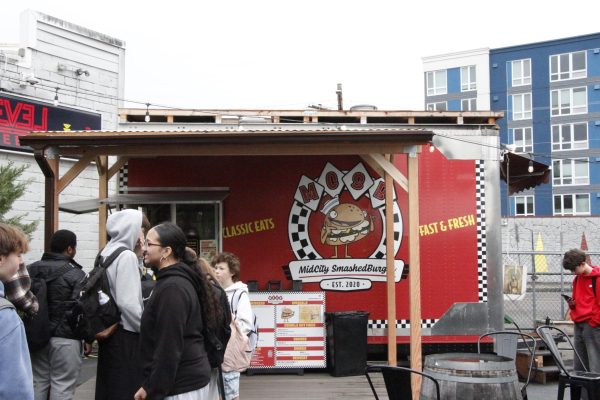 Food truck with people around it